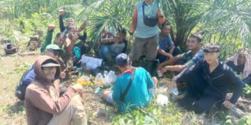 PAC LDII Pematang Kandis Gelar Gotong Royong Bersihkan Kebun Sawit