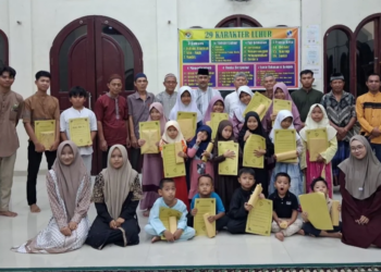 LDII Tanjung Raja Barat Bagikan Rapor TPQ, Apresiasi Peserta Didik