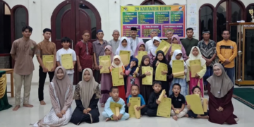 LDII Tanjung Raja Barat Bagikan Rapor TPQ, Apresiasi Peserta Didik